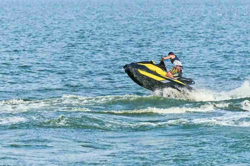 riding a jet ski in the ocean